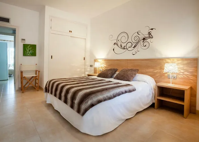 Apartamento a pie de playa, climatizado y parking